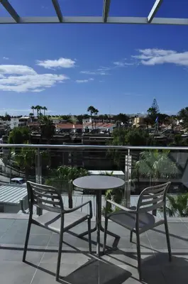 Un balcón o terraza de Apartamentos El Palmar