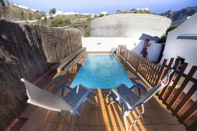 Piscina en o cerca de Vivelorural casa Tunte 1, piscina y terraza