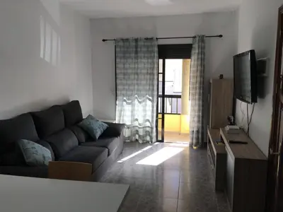 Una televisión o centro de entretenimiento en Apart Juan de Cardona