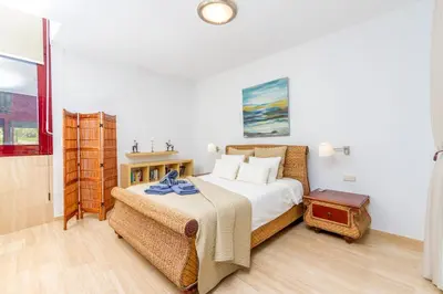 Cama o camas de una habitación en Anfi Tauro Rentals