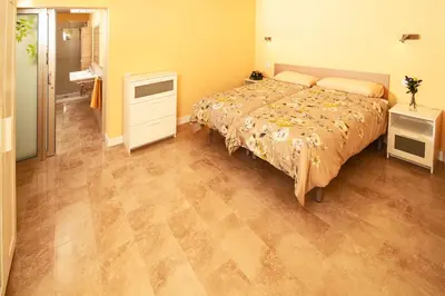 Cama o camas de una habitación en San Nicolás