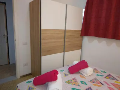 Cama o camas de una habitación en Holiday Apartment