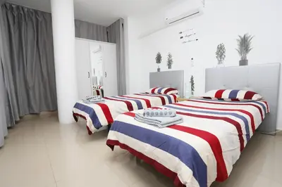 Cama o camas de una habitación en Masvacation Duna Exerlsior 3Room,Pool