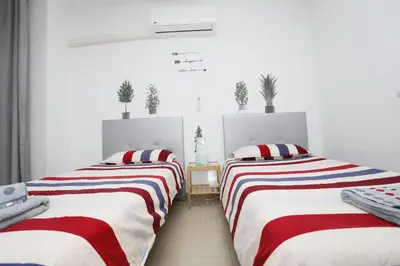 Cama o camas de una habitación en Masvacation Duna Exerlsior 3Room,Pool