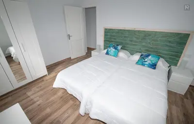 Cama o camas de una habitación en Casa Playa Ondina