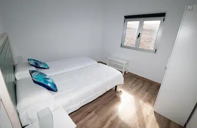 Cama o camas de una habitación en Casa Playa Ondina