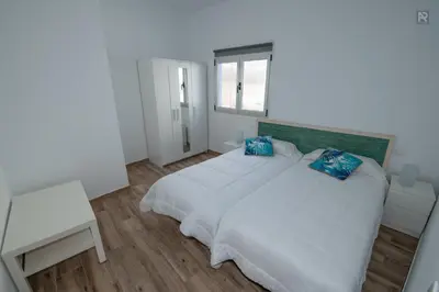 Cama o camas de una habitación en Casa Playa Ondina