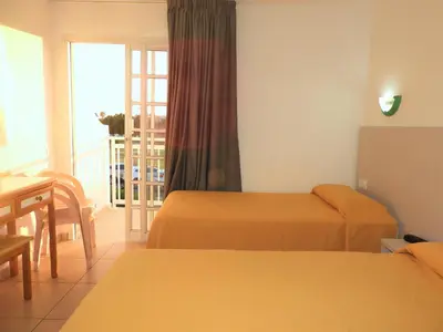 Cama o camas de una habitación en Bungalows Parque Nogal