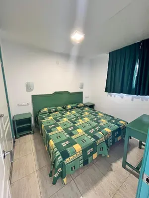 Cama o camas de una habitación en Apartamentos Florida Gran Canaria Adults Only
