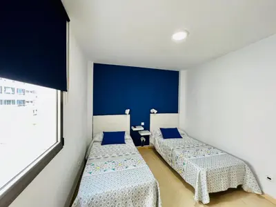 Cama o camas de una habitación en Apartamento Muelle Deportivo