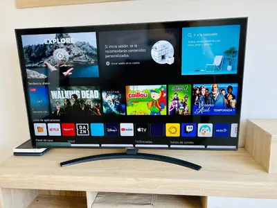 Una televisión o centro de entretenimiento en Apartamento Muelle Deportivo