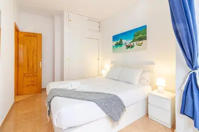 Cama o camas de una habitación en Lovely Flat Santa Catalina Park