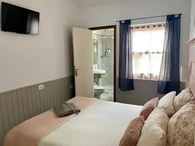 Cama o camas de una habitación en La Casita de Las Palmas VV