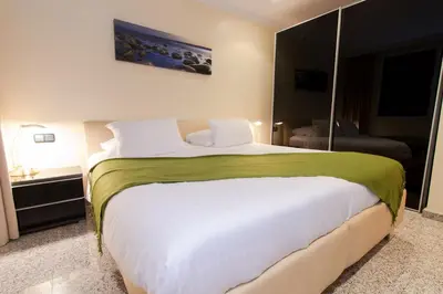 Cama o camas de una habitación en Casa León Royal Retreat