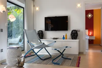 Una televisión o centro de entretenimiento en Apartment Monte Del Moro