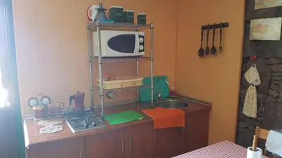 Una cocina o zona de cocina en Casa de piedra a 2 km de la Playa
