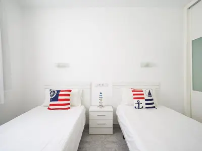 Cama o camas de una habitación en Bungalows Caribe