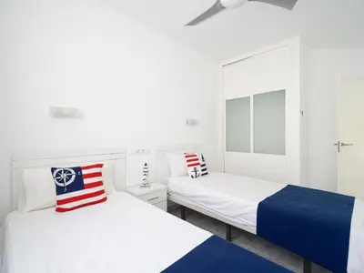 Cama o camas de una habitación en Bungalows Caribe