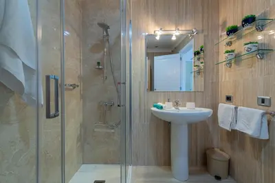Un baño de Deisy Apartments