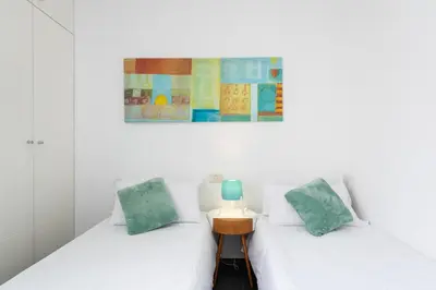 Cama o camas de una habitación en Living Las Canteras Homes - LAS CANTERAS PENTHOUSE