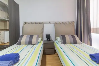 Cama o camas de una habitación en Estudio en Las Canteras II