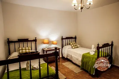 Cama o camas de una habitación en Casa Cueva El Molino By Artenatur
