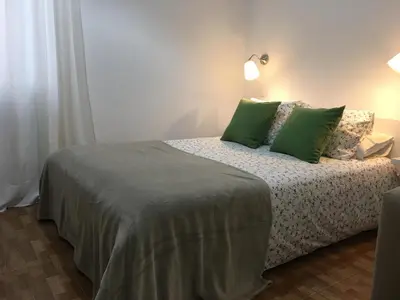 Cama o camas de una habitación en Estudios Ciudad Jardín