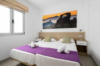 Cama o camas de una habitación en Canteras Suites