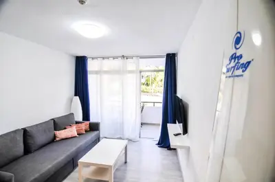 Zona de estar de Prosurfing Apartamento