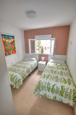 Cama o camas de una habitación en Casa Cocodrilo by CASAS COCODRILO