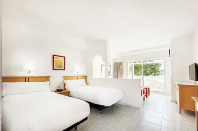 Cama o camas de una habitación en Apartamentos LIVVO Koala Garden