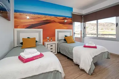 Cama o camas de una habitación en Salobre Vista Golf 16