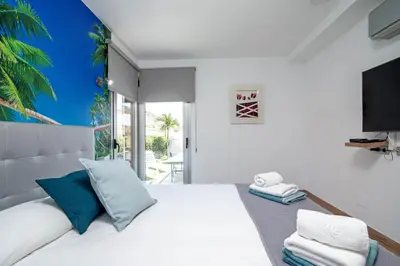 Cama o camas de una habitación en Salobre Vista Golf 16