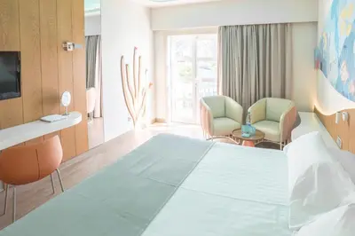 Cama o camas de una habitación en Hotel LIVVO Puerto de Mogán