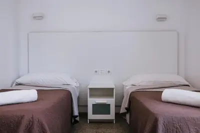 Cama o camas de una habitación en Apartamentos Tarahal