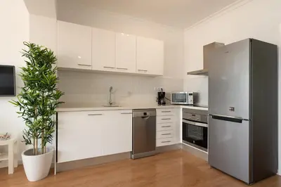 Una cocina o zona de cocina en Living Las Canteras Homes - BEACH HOME