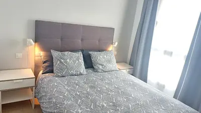 Cama o camas de una habitación en Modern house with 2 bedrooms near the beach