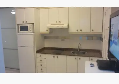 Una cocina o zona de cocina en Apartamentos Syria Las Canteras