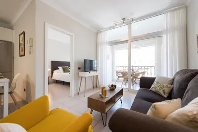 Cama o camas de una habitación en Sunny Sky Apartment