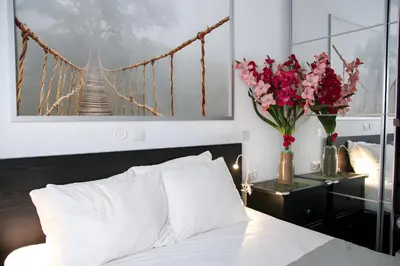 Cama o camas de una habitación en Interior Studio Serviced Apartment