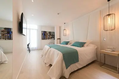 Cama o camas de una habitación en HC Luxe