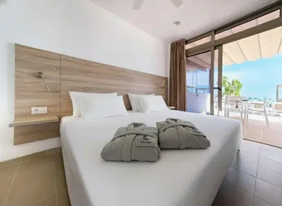 Cama o camas de una habitación en Servatur Altamar