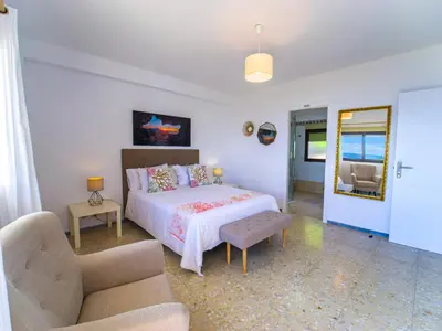 Una televisión o centro de entretenimiento en Villa GUACIMARA