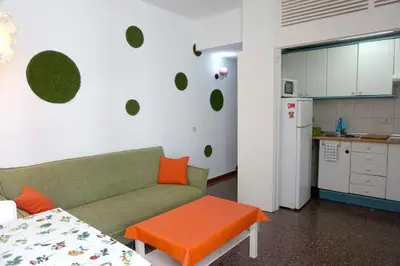 Una cocina o zona de cocina en Mai City Apartment