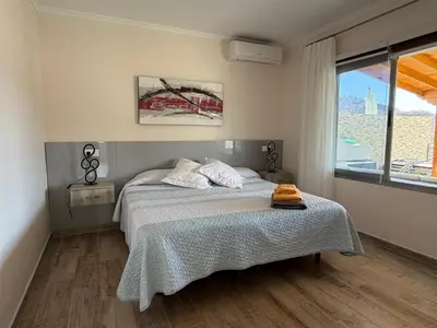 Cama o camas de una habitación en Villa Sunset Tauro