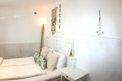 Cama o camas de una habitación en Guesthouse Ca'Artù