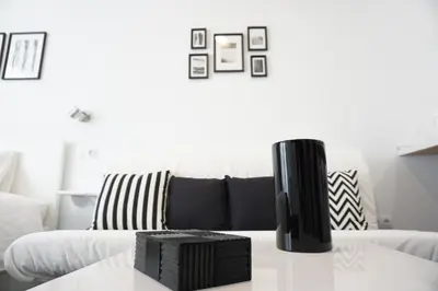 Zona de estar de Black & White Las Canteras