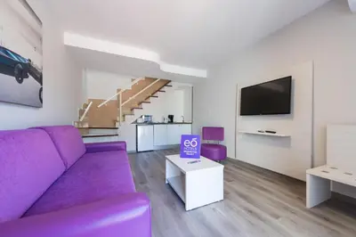 Una televisión o centro de entretenimiento en eó Maspalomas Resort