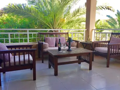 Un balcón o terraza de TAURO GOLF & BEACH VILLA