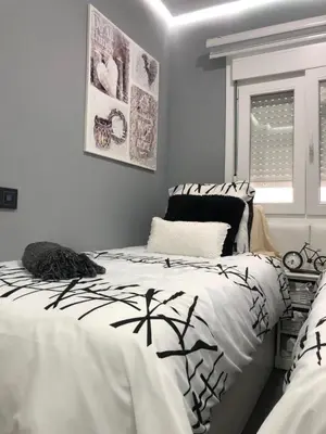 Cama o camas de una habitación en Apartamento Victorio Las Canteras